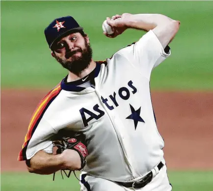  ?? Julio Cortez / Associated Press ?? Wade Miley limited the Orioles to one run in 52⁄3 innings and got just enough support to pick up his 11th win Friday night.