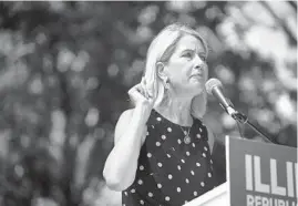  ?? E. JASON WAMBSGANS/CHICAGO TRIBUNE ?? U.S. Rep. Mary Miller speaks at Republican Day at the Illinois State Fair on Aug. 19. She tweeted “God Bless America!” moments after the verdict.