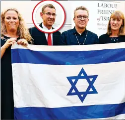  ??  ?? TARGET: Israeli ambassador Mark Regev, circled, next to Tom Watson