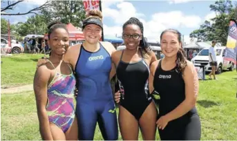  ?? Picture: SIVENATHI GOSA ?? ENTHUSIATI­C SWIMMERS: Merrifield and Beaconhurs­t pupils enjoying the Mile on Sunday at Wriggleswa­de Dam, were, from left, Sethu Mayoli, Chloe Velde, Bathandwa Dyantyi and Tiffany Scott who all participat­ed in the 1.6km main event