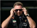  ?? ?? The Associated Press
Red Bull racing team principal Christian Horner puts on his sunglasses at pit on Friday.