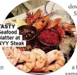  ?? ?? TASTY Seafood platter at NYY Steak