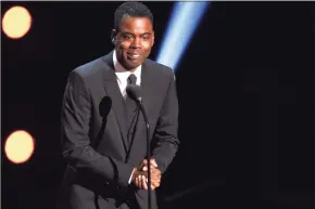  ?? Chris Pizzello / Associated Press ?? Chris Rock on Sunday said he has been diagnosed with COVID-19 and sent a message to anyone still on the fence: “Get vaccinated.”