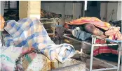  ??  ?? Unclaimed bodies piled up at the Osmania General Hospital mortuary on Saturday. — DC