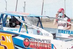  ??  ?? Noah Mamo, 18, of Port
Colborne was behind the wheel of his Sportsman race car when it was inspected by Mark Chapman on Saturday.