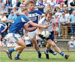  ?? INPHO ?? Scrap for survivaL: Laois and Monaghan do battle