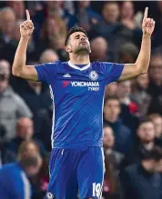  ?? — AFP ?? Chelsea’s Diego Costa celebrates his goal against Southampto­n in their Premier League match at Stamford Bridge in London on Tuesday. The Blues won 4-2. —