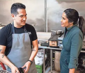  ?? DOMINIC VALENTE/HULU ?? Padma Lakshmi cooks with El Paso chef Emiliano Marentes of the modern restaurant Elemi in Episode 1 of “Taste the Nation With Padma Lakshmi,” which debuts on Hulu on June 18.