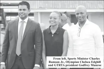  ?? ?? From left, Sports Minister Charles Ramson Jr., Olympian Chelsea Edghill and GTRTA president Godfrey Munroe