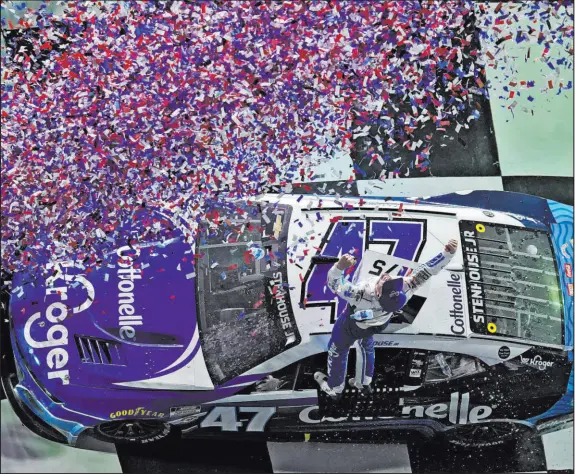  ?? Chris O’meara The Associated Press ?? Ricky Stenhouse Jr. celebrates after winning the Daytona 500 on Sunday for his first victory in nearly six years in the NASCAR Cup Series.