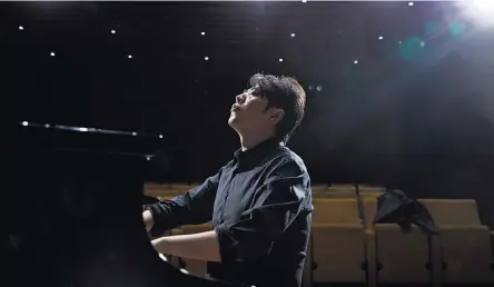  ?? GUS POWELL FOR THE NEW YORK TIMES ?? After a year off because of an injury, Lang Lang is back to melding classical and pop sensibilit­ies.
