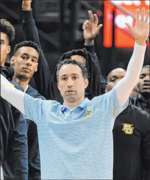  ?? Morry Gash The Associated Press ?? Marquette men’s basketball coach Shaka Smart enters his first season at the Big East program after previous stints at Texas and VCU.