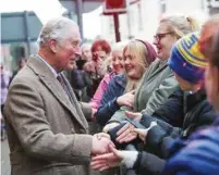  ?? (Chris Jackson/Pool via Reuters) ?? PRINCE CHARLES visits Pontypridd, Wales, in February, after it was affected by floods.