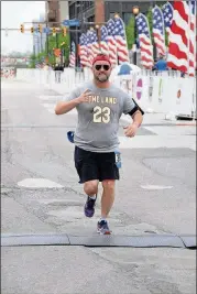  ?? CONTRIBUTE­D ?? Atlanta restaurate­ur Shaun Doty took up marathon running in 2016. “My goal is to be able to complete the marathon before the street sweeper comes by me,” said Doty. “As long as I don’t get kicked off the course, I consider it a win.”