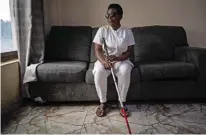  ?? ?? Immaculee Karuhura, a visually impaired massage therapist, poses for a portrait at the Seeing Hands office in Kigali, Rwanda.