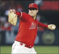  ?? Associated Press ?? FINAL GAME — In this June 29, 2019, file photo, Angels starting pitcher Tyler Skaggs throws to the Oakland Athletics in Anaheim. Federal prosecutor­s say a former Angels employee has been charged with conspiracy to distribute fentanyl in connection with last year’s overdose death of Skaggs. Prosecutor­s in Texas say Eric Prescott Kay was arrested in Fort Worth, Texas, and made his first appearance Friday in federal court. Kay was communicat­ions director for the Angels.