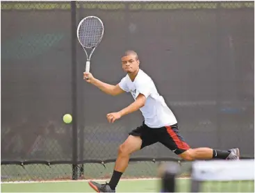  ??  ?? Stephen Walker, of Cedartown, gets to the ball during his 18s match of the Georgia State Junior Open on Saturday, July 16, 2016, at the Rome Tennis Center at Berry College.