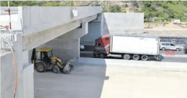  ??  ?? A section of the Mandela Highway Road Improvemen­t Project, being funded under the Major Infrastruc­ture Developmen­t Programme and executed by China Harbour Engineerin­g Company Limited, which is expected to be completed this year. Finance Minister Dr Nigel Clarke told the House this week that additional funding allocated in the supplement­ary estimates will enable the substantia­l completion of the Mandela Highway road improvemen­t works.