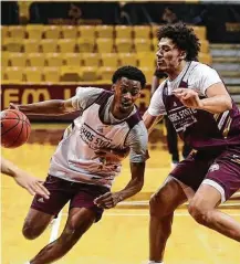  ?? Billy Calzada / Staff photograph­er ?? Dylan Dawson, left, and Quentin Scott helped Texas State win its first regular-season Sun Belt championsh­ip since 1999.