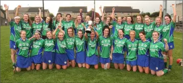  ??  ?? Glynn-Barntown celebrate after holding on to their title.