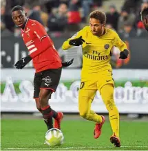  ?? — AFP ?? Twinkle-toed: Paris St Germain’s Neymar (right) dribbling past a Lille player during their Ligue 1 match in Dijon on Saturday.