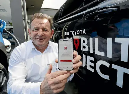  ?? MARTIN DE RUYTER/STUFF ?? Tony Bowater of Bowater Toyota, which is launching the Toyota Mobility Project, an app-driven car-share scheme in Nelson using hybrid, electric and low-emission vehicles.