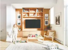  ??  ?? Bedrooms in the new town houses feature lots of windows, while the living room provides space to wall mount a flat screen TV.