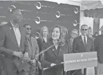  ?? CLARA HENDRICKSO­N/DETROIT FREE PRESS ?? Gov. Gretchen Whitmer announces a new council that will focus on growing Michigan's population at a news briefing held on Mackinac Island in June.