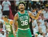  ?? LYNNE SLADKY/AP ?? Celtics guard Marcus Smart had 24 points, 12 assists and nine rebounds against the Heat in Thursday’s Game 2 win.