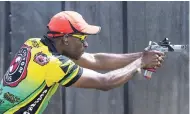  ?? GLADSTONE TAYLOR/PHOTOGRAPH­ER ?? Jamaica’s Lesgar ‘Speedy’ Murdock in action on Day Two of the Pan American Handgun Championsh­ips at Woodleigh Sports Complex in Clarendon yesterday.