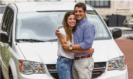  ?? — TNS ?? Schipke, left, and Marzano met in an UberPool six months ago, and now they’re engaged. They are shown in front of an Uber vehicle they called to take them home.