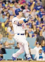  ?? Harry How Getty Images ?? CODY BELLINGER watches his second-inning homer, his second of the game and 21st of the season.