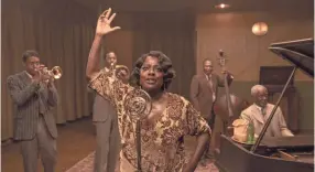  ?? DAVID LEE/NETFLIX ?? Chadwick Boseman, from left, as Levee, Colman Domingo as Cutler, Viola Davis as Ma Rainey, Michael Potts as Slow Drag and Glynn Turman as Toledo in a scene from the Netflix film of August Wilson’s “Ma Rainey’s Black Bottom.”