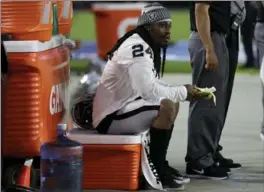  ?? ASSOCIATED PRESS FILE PHOTO ?? Marshawn Lynch avoided questions about his decision to sit during the playing of the national anthem on Aug. 12.