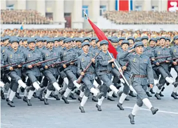  ??  ?? North Korean soldiers take part in a military parade at Kim Il-sung Square in Pyongyang