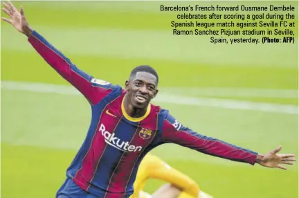  ?? (Photo: AFP) ?? Barcelona’s French forward Ousmane Dembele celebrates after scoring a goal during the Spanish league match against Sevilla FC at Ramon Sanchez Pizjuan stadium in Seville, Spain, yesterday.