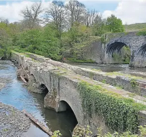  ?? PHOTO: IWA ?? The Aberdulais Aqueduct which carries the Tennant Canal over the River Neath.