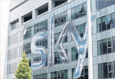  ?? LUCA BRUNO THE ASSOCIATED PRESS ?? Regulators resorted to an auction after Fox, backed by Disney, and Comcast engaged in a series of bids and counterbid­s for Sky.