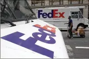  ?? MARK LENNIHAN / AP 2017 ?? FedEx opposes assault rifles being owned by civilians, but says it strongly supports a person’s right to own a firearm. The Memphis, Tenn.-based hauler will continue its NRA business partnershi­p.