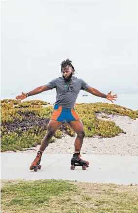  ?? KENDRICK BRINSON/THE NEW YORK TIMES ?? Terrance Brown roller-skates along a beach path in Santa Barbara, California. “The only reason I stop skating is when the sun goes down,” Brown said.