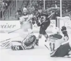  ?? Daniel Brenner, Special to The Denver Post ?? Colorado center Alexander Kerfoot scores in the third period against the St. Louis Blues on Thursday night at the Pepsi Center. The Avalanche lost 4-3.