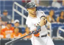  ??  ?? Giancarlo Stanton Miami’s slugging right fielder is trying to become only the sixth player in history to hit at least 60 home runs in a season. Stanton usually torches Rockies pitchers and has two of the 10 longest home runs in Coors Field history (504...