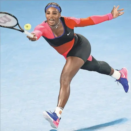  ?? DAVID GRAY/ AFP VIA GETTY IMAGES ?? Serena Williams hits a return against No. 2 seed Simona Halep during their singles quarterfinal match Tuesday in the Australian Open. Williams won 6- 3, 6- 3.