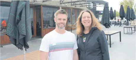  ?? ?? Waterside owner and manager Greg Sherson (left) and Taupō District Council stakeholde­r manager Julie McLeod.