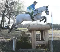  ??  ?? Dani Evans and Smart Time consolidat­e a good dressage with a double clear for an OI victory