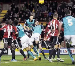  ??  ?? GET OUT THE WAY: Blackburn’s Ben Marshall heads at goal