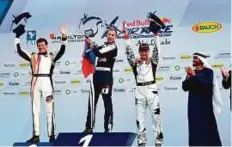  ?? Abdul Rahman/Gulf News ?? Martin Sonka of the Czech Republic (second left) celebrates his victory on the podium with runner-up Juan Velarde (left) and second runner-up Pete Mcledo of Canada after Shaikh Nahyan Bin Zayed Al Nahyan presented the trophies.