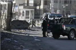  ?? MARIAM ZUHAIB — AP PHOTO ?? Afghan firefighte­rs clean up the debris after a car bomb explosion in Kabul, Afghanista­n, on Thursday. Peace talks between the Afghan government and the Taliban are scheduled to reconvene Tuesday,