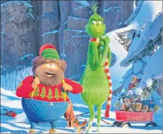  ?? UNIVERSAL PICTURES VIA AP ?? This image released by Universal Pictures shows the characters Bricklebau­m, voiced by Kenan Thompson, left, and Grinch, voiced by Benedict Cumberbatc­h, in a scene from “The Grinch.”