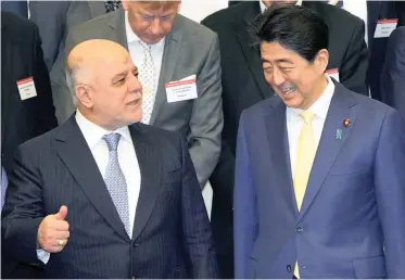 ?? PICTURE: AP ?? CONFERENCE CALL: Prime Minister of Iraq Haider al-Abadi with Japanese Prime Minister Shinzo Abe at the opening ceremony of the expert level of the Internatio­nal Conference on Iraqi Economic Developmen­t in Tokyo yesterday.
